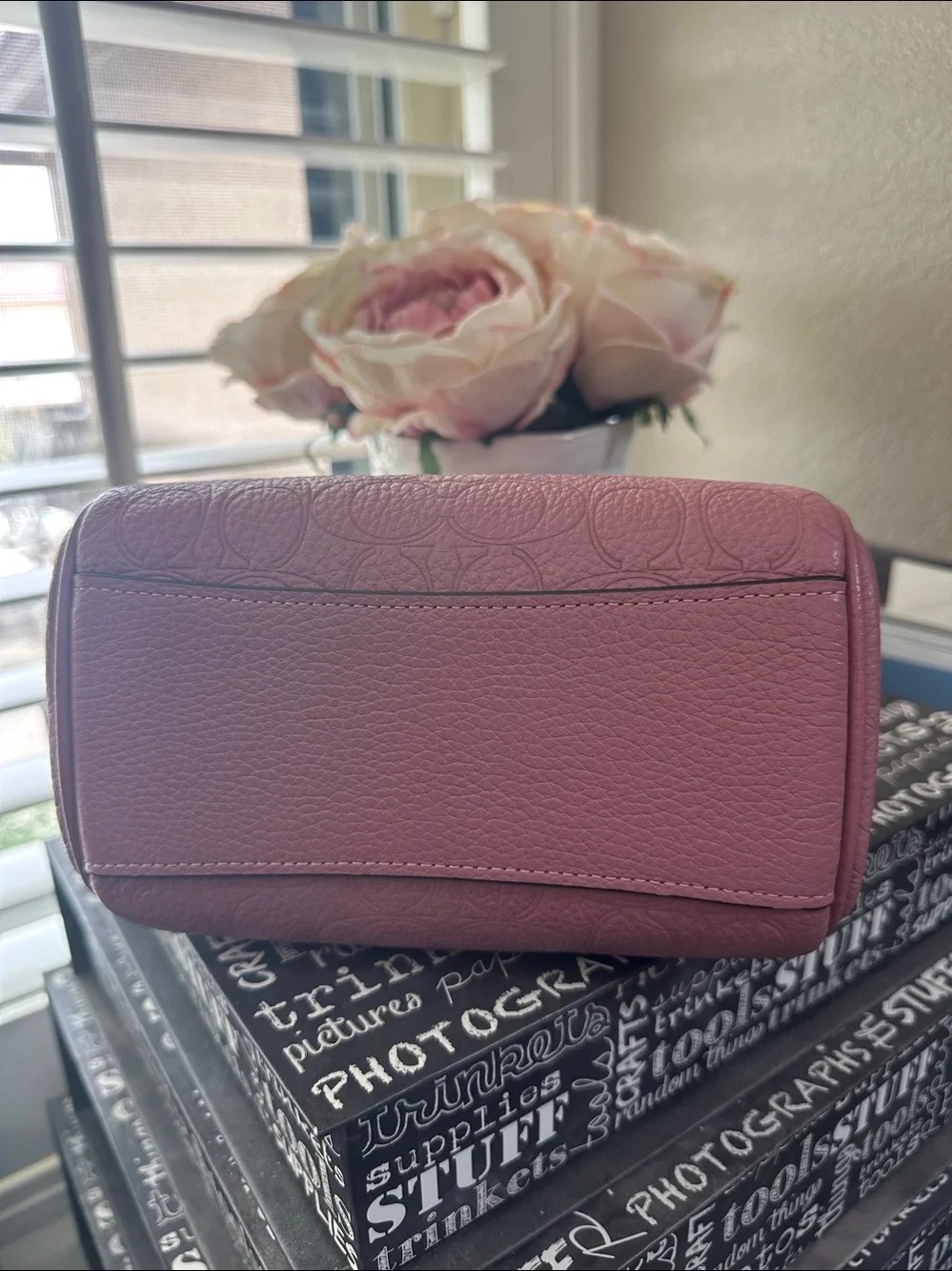 Coach mini Rowan signature leather in the color peony
